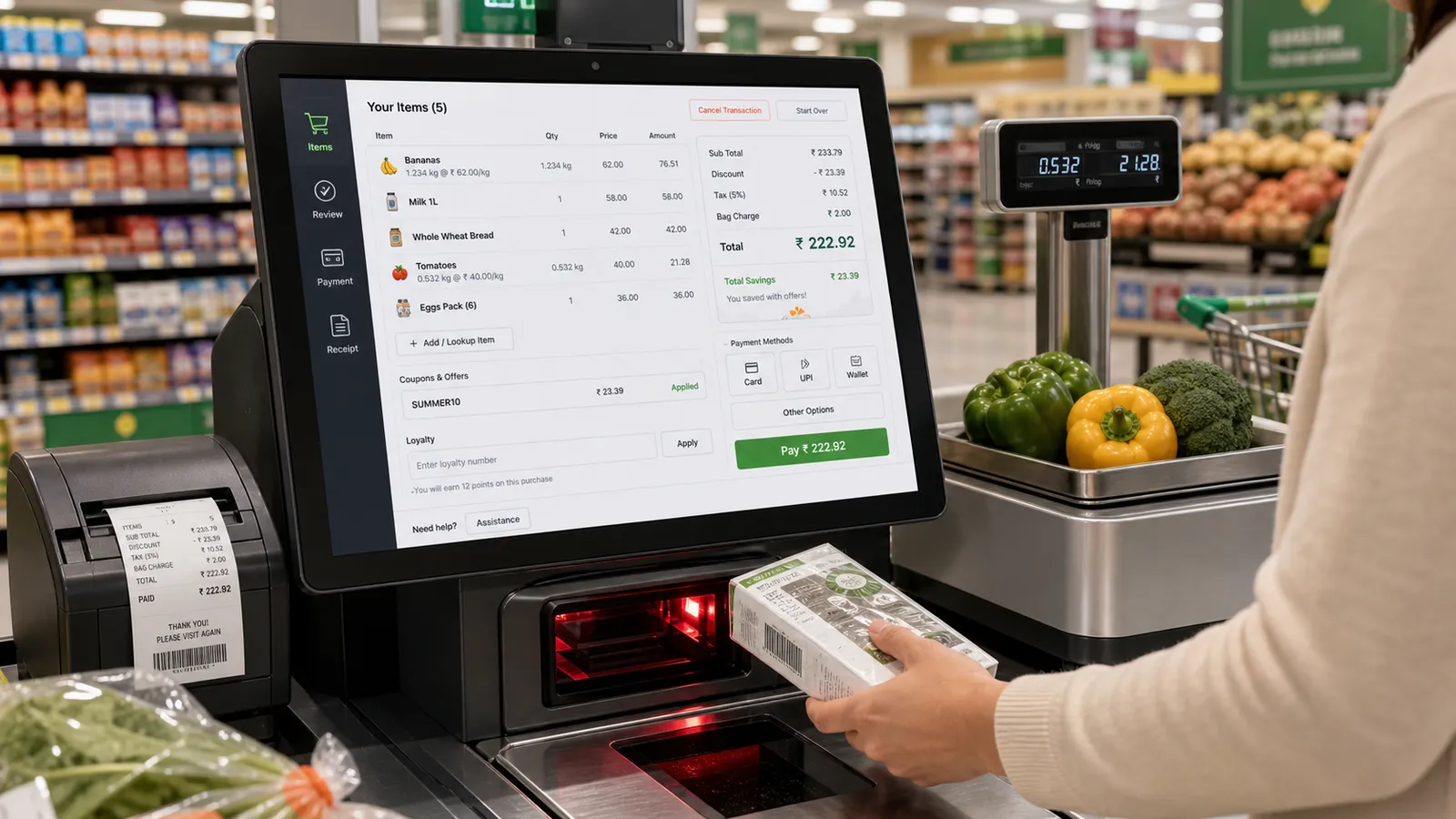 Customer scanning groceries at a Folio self-checkout kiosk in a supermarket