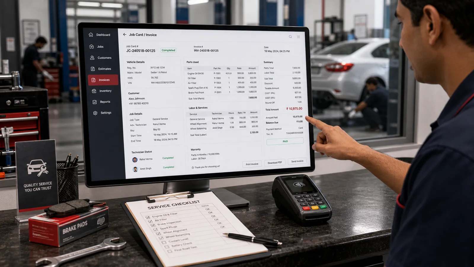 Mechanic pointing at a Folio job-card invoice beside a service checklist