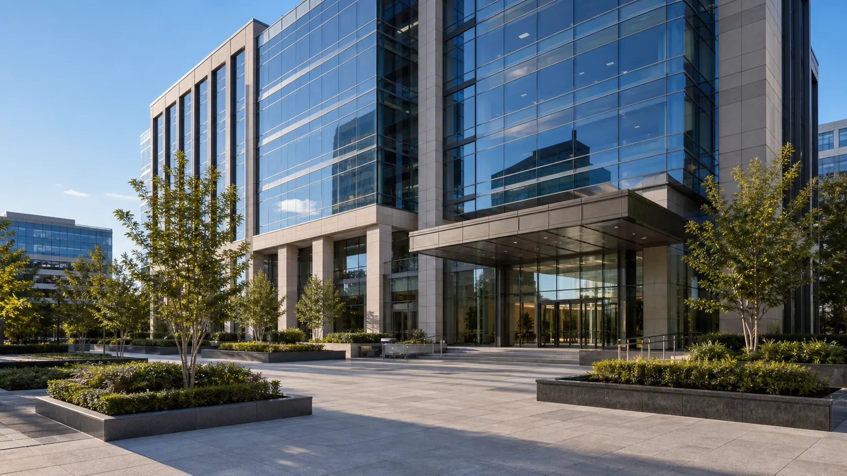 Vespera Exchange, glass office building and plaza