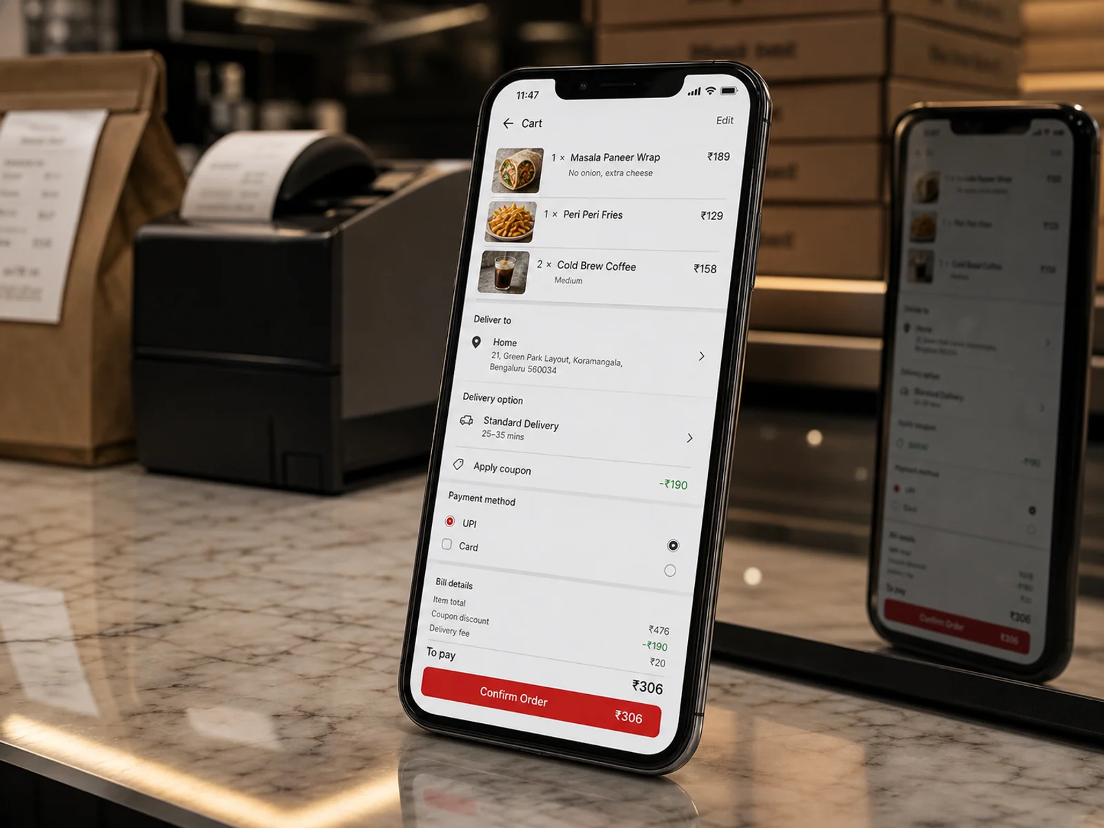 Mobile cart and checkout screen with items, delivery options, payment choices and order total.